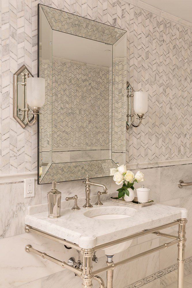 Allure is used on an upper wall and as a decorative border above the baseboard in this classic bath.