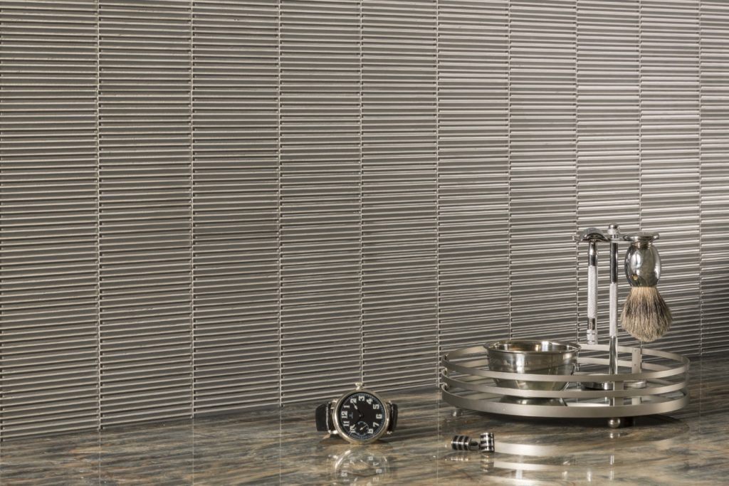 Loom in Silver Silk graces a gentleman's dressing area with an Art Deco feel.